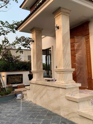 Đá marble vân gỗ chéo ốp cột ốp mặt tiền