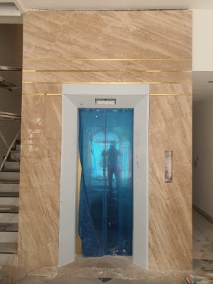 Đá marble vân gỗ Tino ốp thang máy
